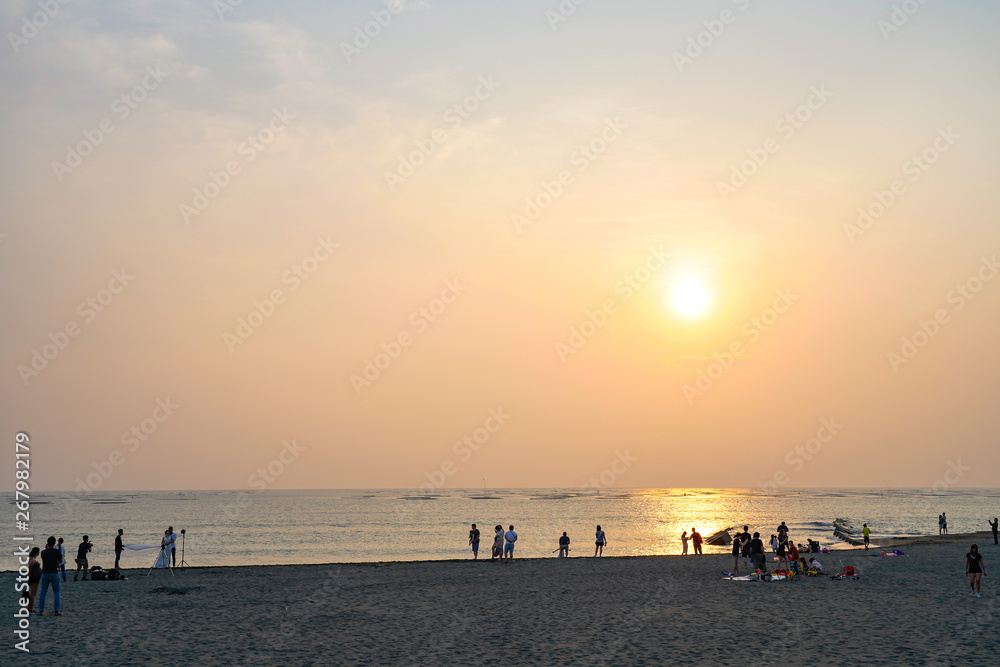 Golden Coast. The largest beach within Tainan city, there are always lots of tourists walking, splashing in the waves and flying kites here in the afternoon.