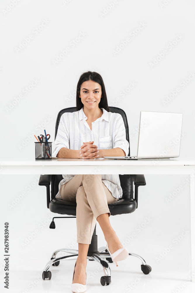 Full length of an attractive young businesswoman Full length of an attractive young businesswoman