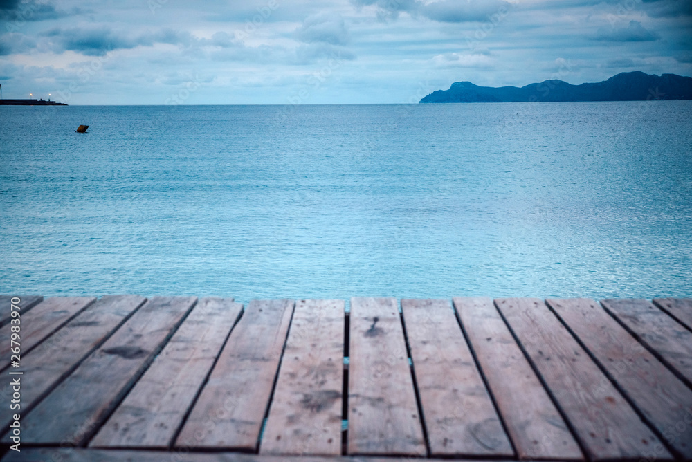 Wooden pier in cloudy morning. Rest, silent, Melancholy concept photo