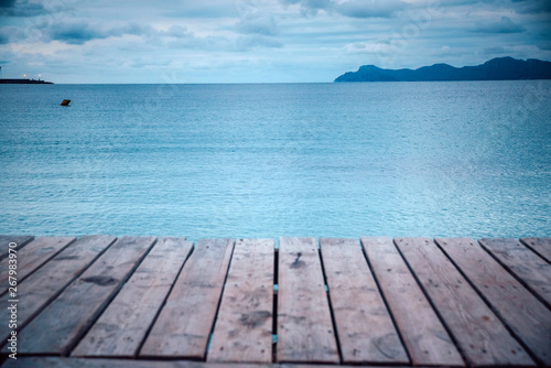 Wooden pier in cloudy morning. Rest  silent  Melancholy concept photo