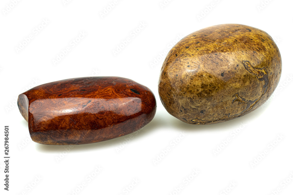 Egg made of wood nature for paperweight, exotic wooden beautiful pattern on white backgroung Egg made of wood nature for paperweight, exotic wooden beautiful pattern on white backgroung
