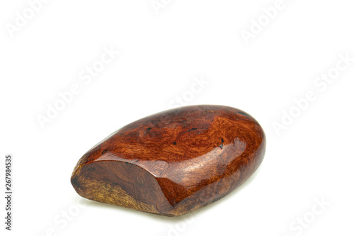 Egg made of wood nature for paperweight, exotic wooden beautiful pattern on white backgroung
