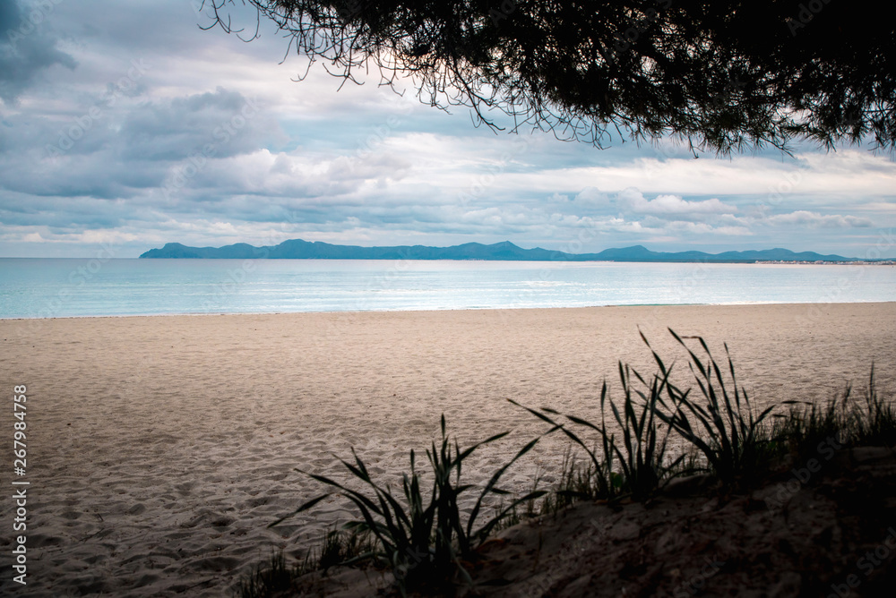 Calm morning beach, Mediterranean sea. Edit space