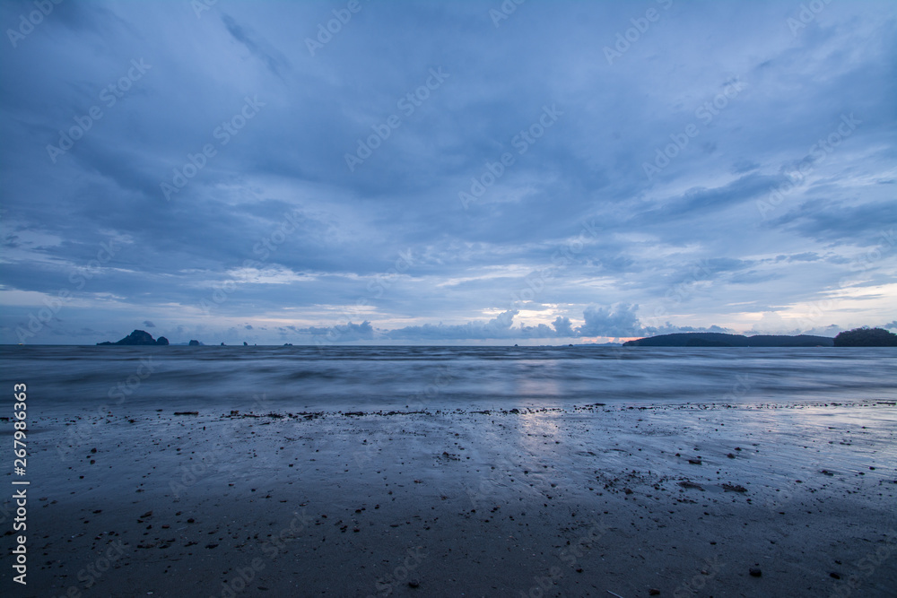 Tropical sunset on the beach. Ao-Nang. Krabi. Thailand Tropical sunset on the beach. Ao-Nang. Krabi. Thailand