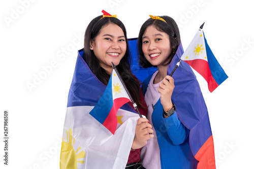 filipino woman holding philippines national flag isolated over white background
