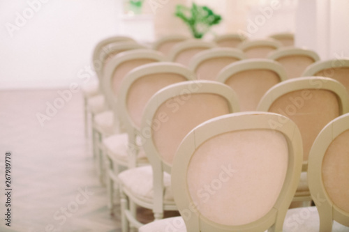 blurred background of row of beautiful chairs on a holiday