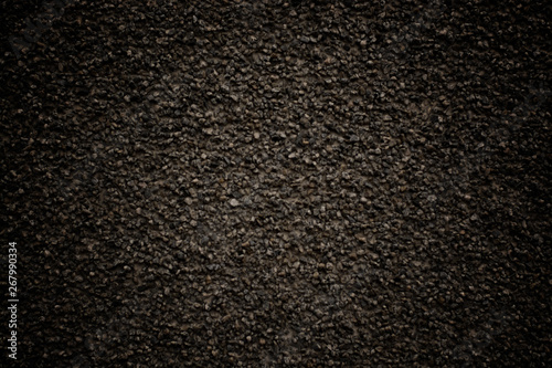 stone background black color with a grainy texture