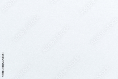 Abstract white grainy paper texture background or backdrop. Empty clean note page or parchment sheet for decorative design element. Simple monochrome textured surface for journal template presentation