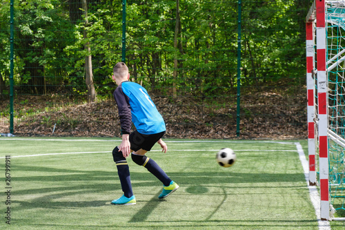 Goalkeeper catches the ball. Stadium goalie sports play ground game, grass soccer keeper man, outdoorsc ompetition, photo