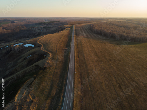 Aerial view of a road in su...