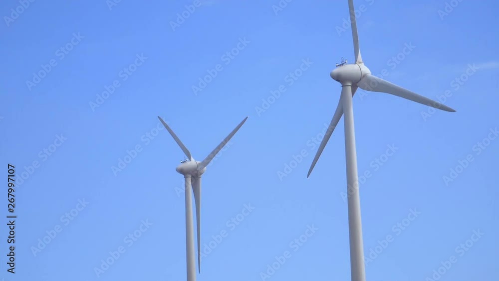 Car POV of windmills turning around in slow motion 180fps Car POV of windmills turning around in slow motion 180fps