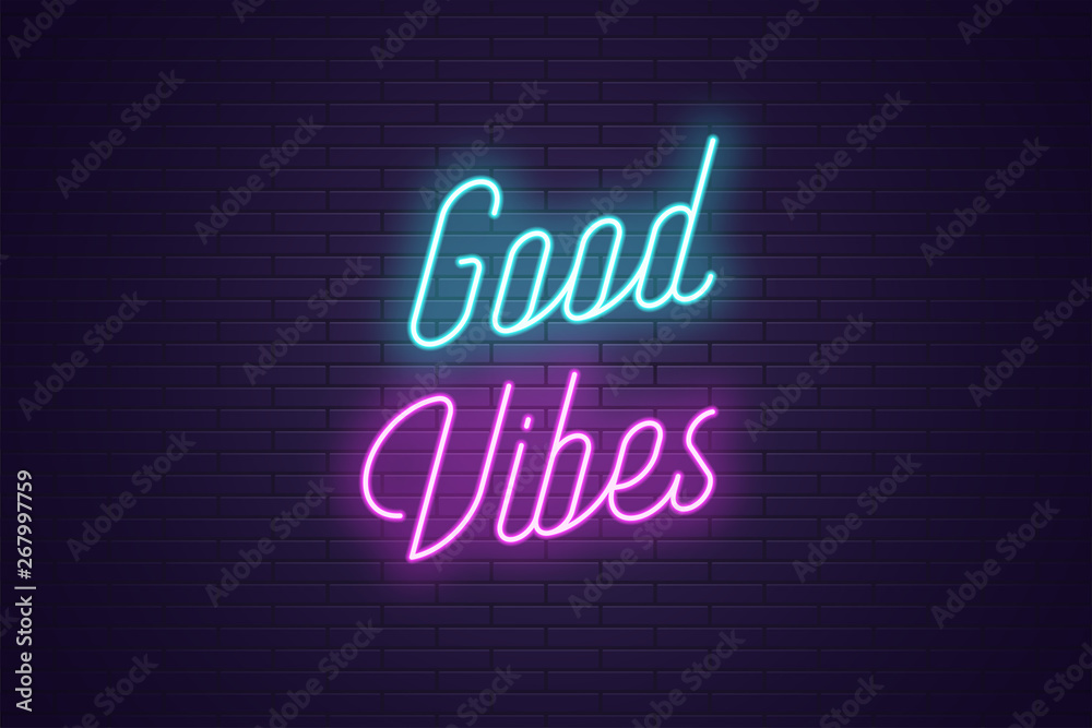 Neon lettering of Good Vibes. Glowing text Neon lettering of Good Vibes. Glowing text