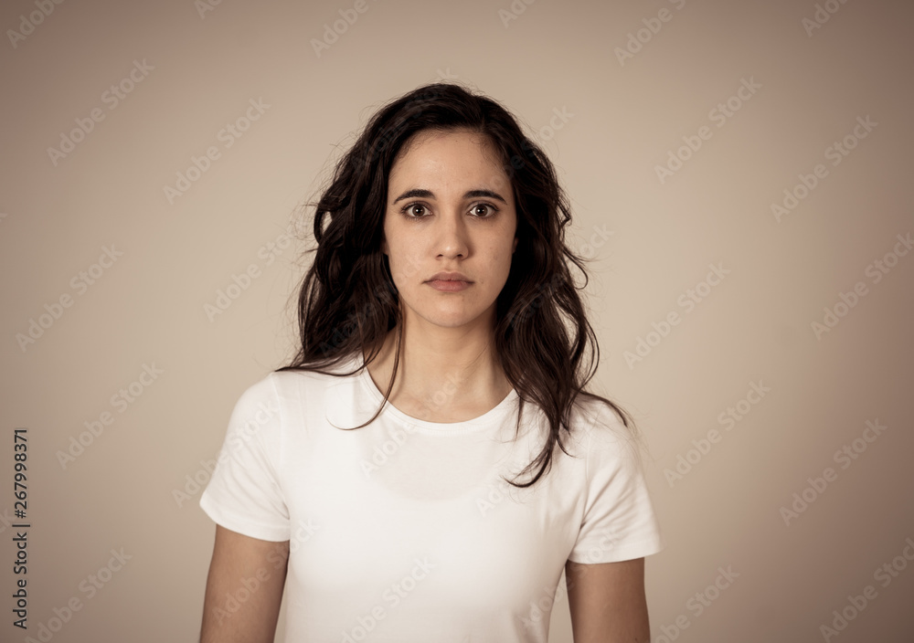 Portrait of a young attractive woman looking scared and shocked. Human expressions and emotions Portrait of a young attractive woman looking scared and shocked. Human expressions and emotions