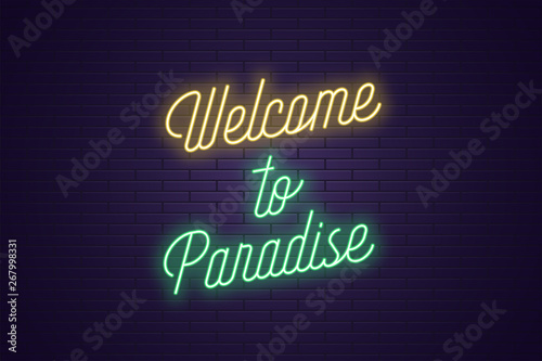 Neon lettering of Welcome to Paradise. Glowing text