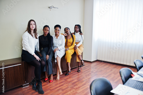 Multiracial women colleagues, crew of divercity female partners in office.
