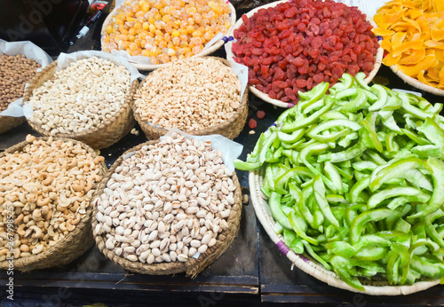 Different dried and candied fruit in a market