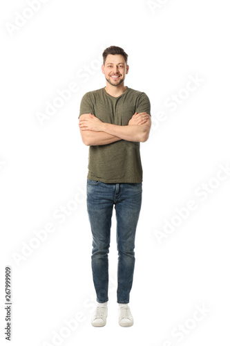 Full length portrait of handsome man posing on white background