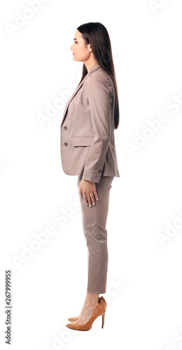 Full length portrait of businesswoman posing on white background