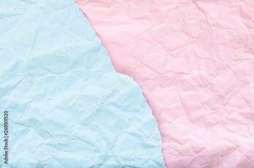 Background of a piece of pink and blue crumpled paper