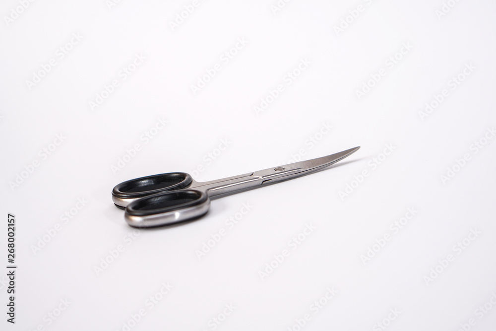 Nail scissors on white isolated white background. Fashion beauty theme. Stock photo Nail scissors on white isolated white background. Fashion beauty theme. Stock photo