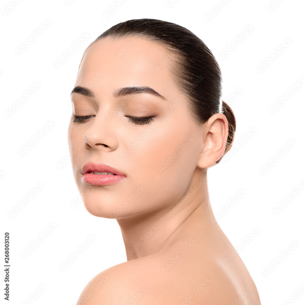 Portrait of young woman with beautiful face and natural makeup on white background Portrait of young woman with beautiful face and natural makeup on white background