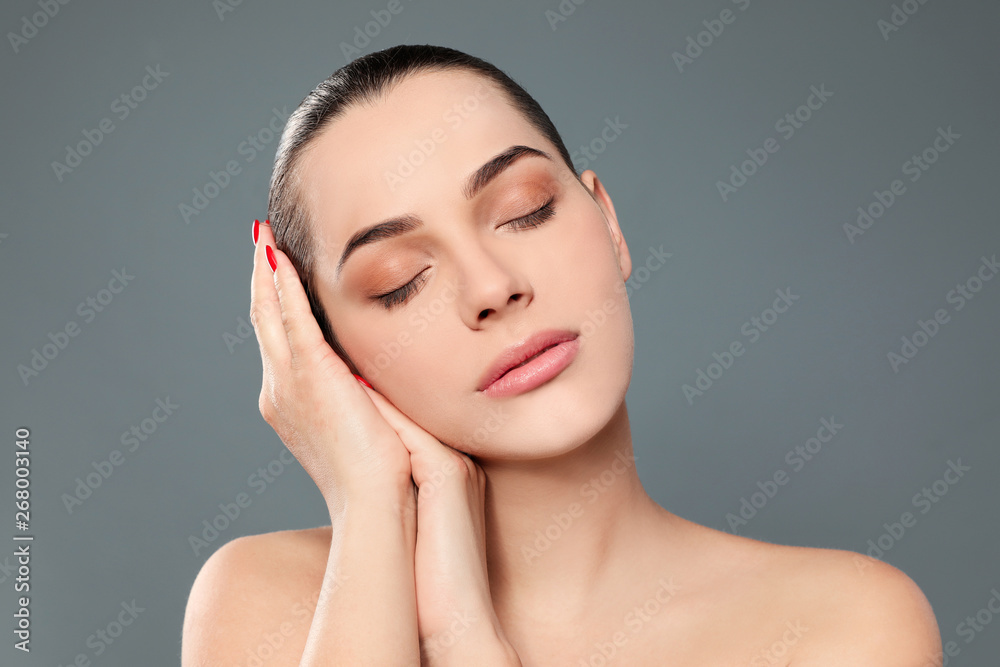 © New Africa - Portrait of young woman with beautiful face and natural makeup on color background © New Africa - Portrait of young woman with beautiful face and natural makeup on color background