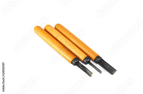 Wood carving tool on white background close up