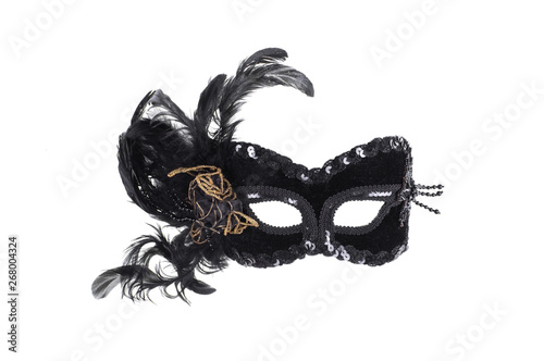 black theatrical mask with feathers isolated on white background