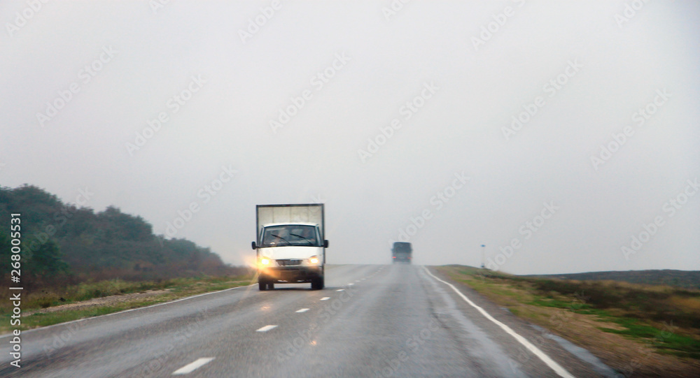 Highway landscape with moving cars at daytime