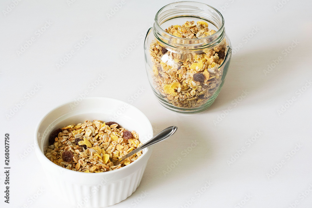 Healthy breakfast. Fresh granola on a white background Healthy breakfast. Fresh granola on a white background