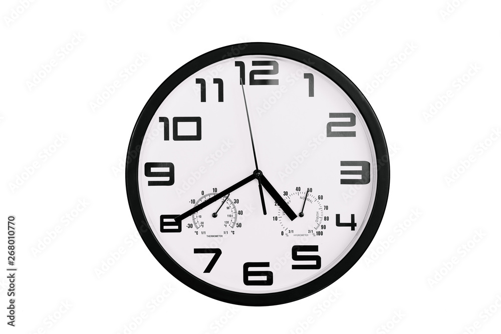 simple classic black and white round wall clock isolated on white. Clock with arabic numerals on wall shows 16:40 , 4:40 simple classic black and white round wall clock isolated on white. Clock with arabic numerals on wall shows 16:40 , 4:40