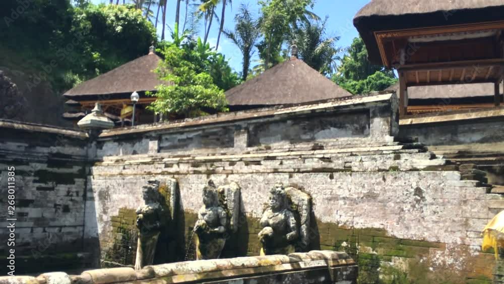 Ancient pool of the balinese temple Goa Gajah, Elephant Cave in Bali, Unesco heritage in Indonesia, 4k footage video Ancient pool of the balinese temple Goa Gajah, Elephant Cave in Bali, Unesco heritage in Indonesia, 4k footage video