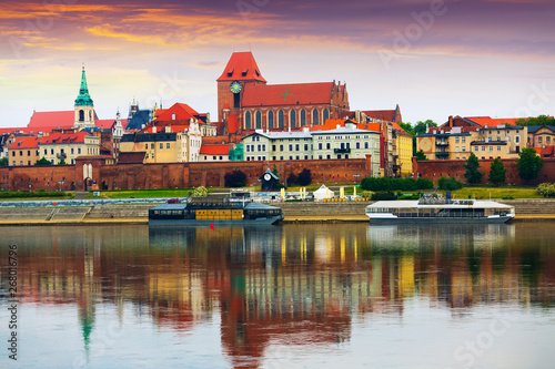 Torun across Vistula at sunset photo