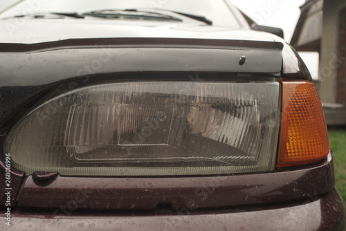 dirty headlight of the car