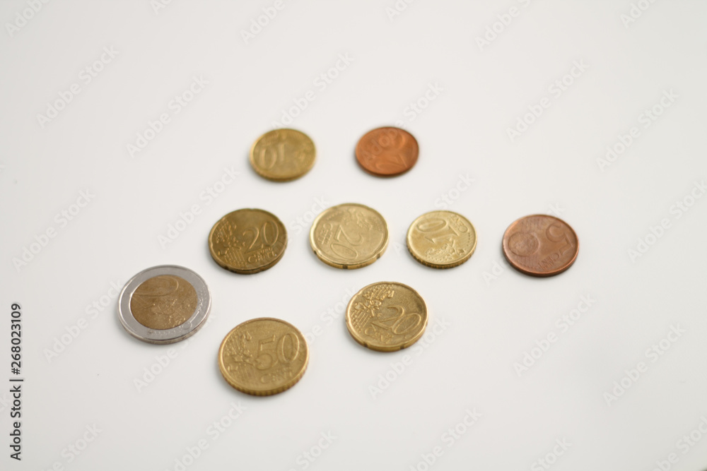 Euro coins on white background close-up 2 Euro 50 cents Euro coins on white background close-up 2 Euro 50 cents