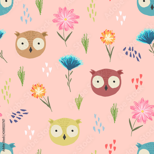 Cute peach color seamless pattern with cartoon owl heads, colorful dots and childish flowers. Funny pink summer hand drawn birds texture for kids design, wallpaper, textile, wrapping paper