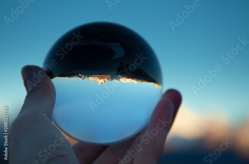 Fitz Roy Mountains in Patagonia Argentina reflected in glass ball