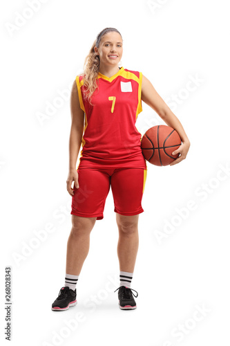 Female basketball player posing with a ball © Ljupco Smokovski