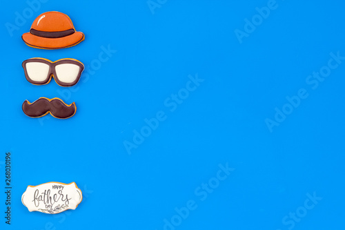 design for Father Day celebration party with cookies on blue background top view mockup