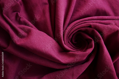 Spiral shape pink textile background