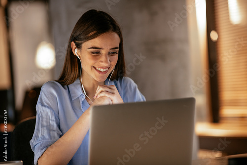 Businesswoman in having a video call on laptop. photo