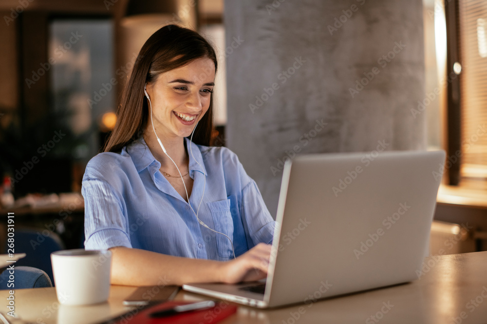Businesswoman in having a video call on laptop. Businesswoman in having a video call on laptop.