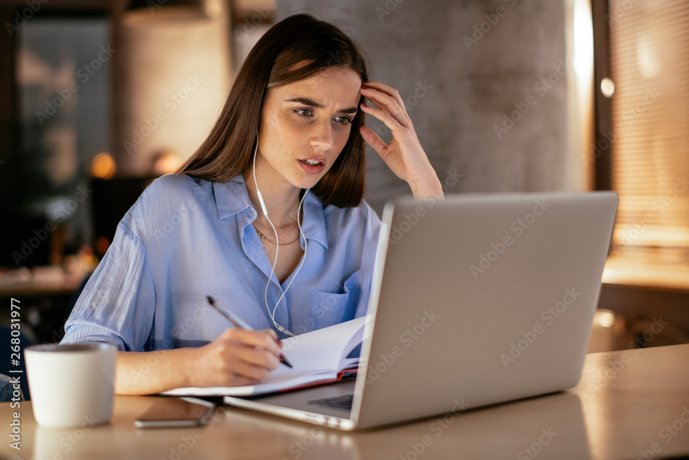 Businesswoman in having a video call on laptop. Businesswoman in having a video call on laptop.