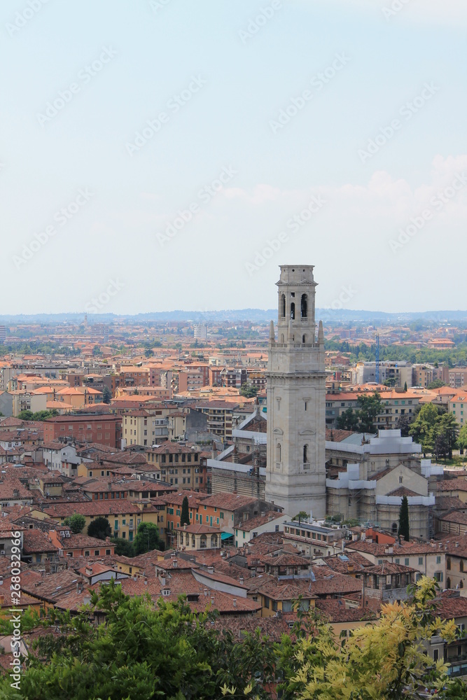 Panorama of Verona Italy with a view of the red roofs of the old town and the tower