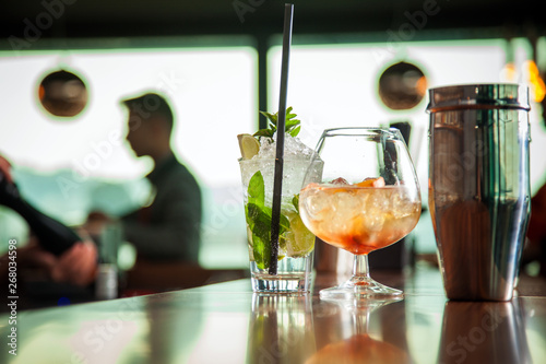 mojito,cognac and blody mary on the bar photo