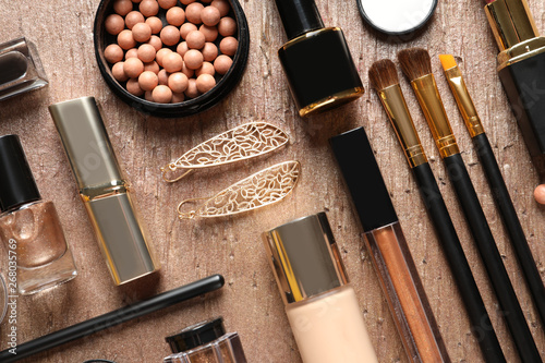 Set of luxury makeup products on color background, flat lay photo
