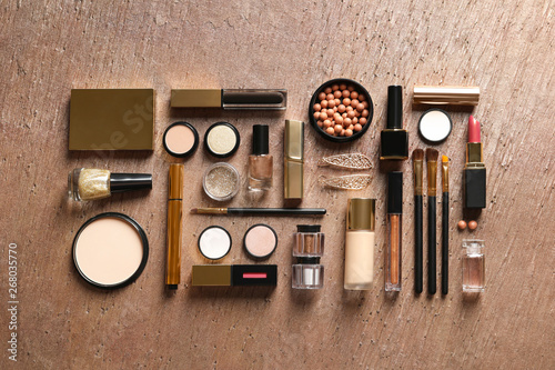 Set of luxury makeup products on color background, flat lay