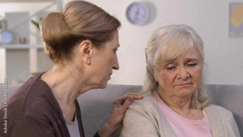 Old woman calming friend in time of trouble, relationship problems, divorce Old woman calming friend in time of trouble, relationship problems, divorce