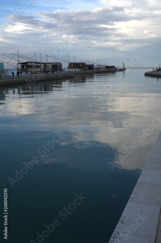 along the canal waiting for the fishermen photo