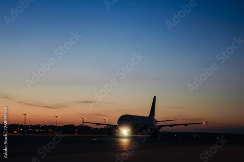 big Aircraft in airport while sunrise